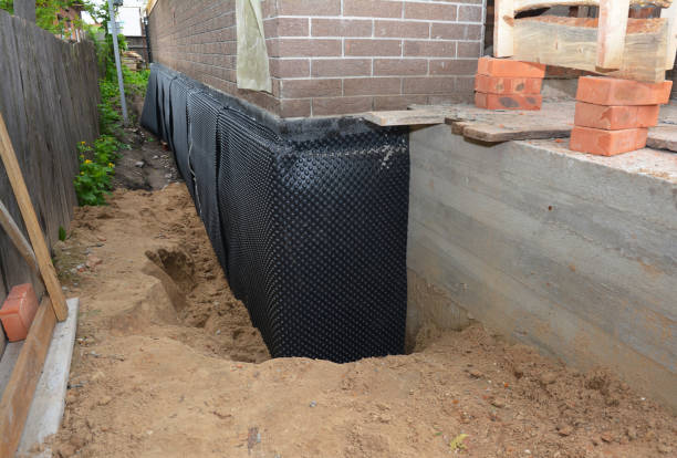 Happy homeowners after waterproofing job in Rosemount
